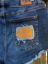 Load image into Gallery viewer, Sz 9 cut off Billy Strings shorts