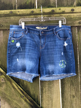 Load image into Gallery viewer, Sz 14 denim cut off shorts with custom embroidery and patches