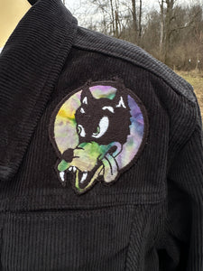 Women’s size M black corduroy button up jacket with custom tie dye appliqués.